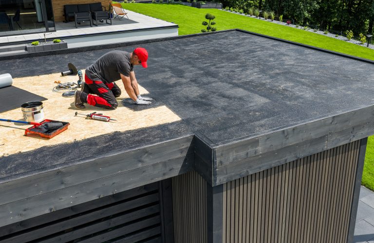worker installing epdm roofing material on a resid 2026 01 09 11 23 59 utc